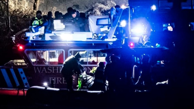 Emergency response units conduct search and rescue operations in the Potomac River. Picture: Al Drago/Getty Images