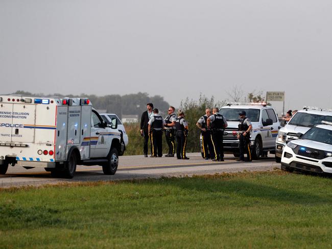 Royal Canadian Mounted Police at the scene where Myles Sanderson was arrested. Picture: Lars Hagberg / AFP