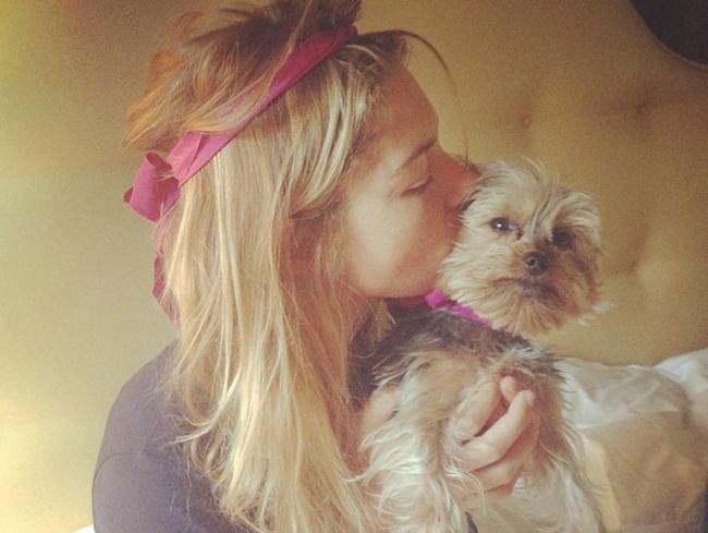 Jess mucking around with her dog. Picture: Instagram