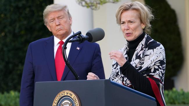 Donald Trump looks on Deborah Birx takes the daily briefing in March. Picture: AFP