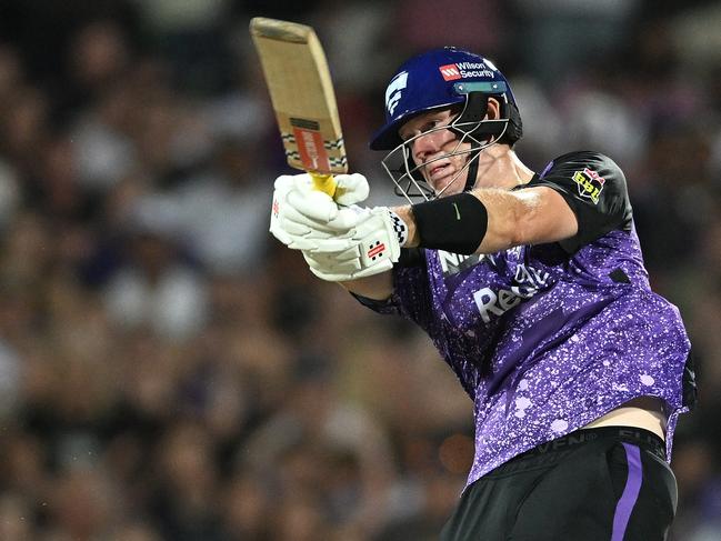 HOBART, AUSTRALIA - JANUARY 27: Mitch Owen of the Hurricanes hits a six during the BBL The Final match between Hobart Hurricanes and Sydney Thunder at Ninja Stadium on January 27, 2025 in Hobart, Australia. (Photo by Steve Bell/Getty Images)