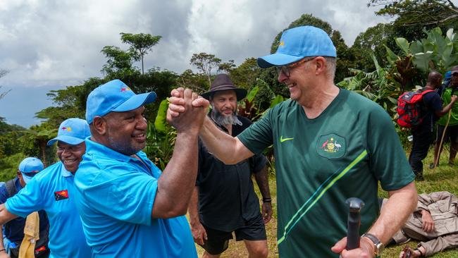 Anthony Albanese and Papua New Guinea Prime Minister James Marape shake hands during a walk along the Kokoda Track last year. Picture: NCA NewsWire via PMO