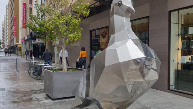 Adelaide City Council has put a planter box behind the Gawler Place pigeon to deter scooter riders and skaters. Picture: Colin James