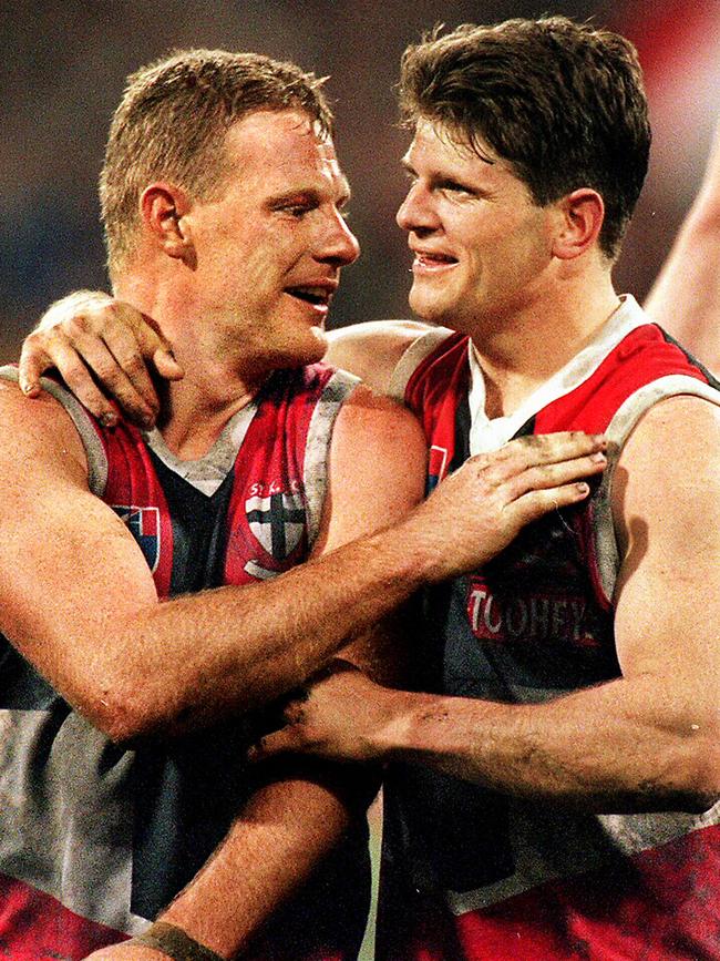 St Kilda greats Nathan Burke and Robert Harvey helped stopped the merger.