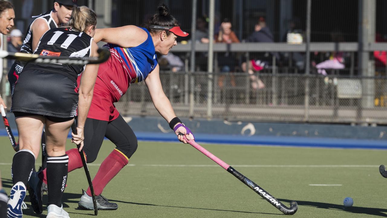 Monique Nacsa (left) of Brisbane 2 against Mackay 1.