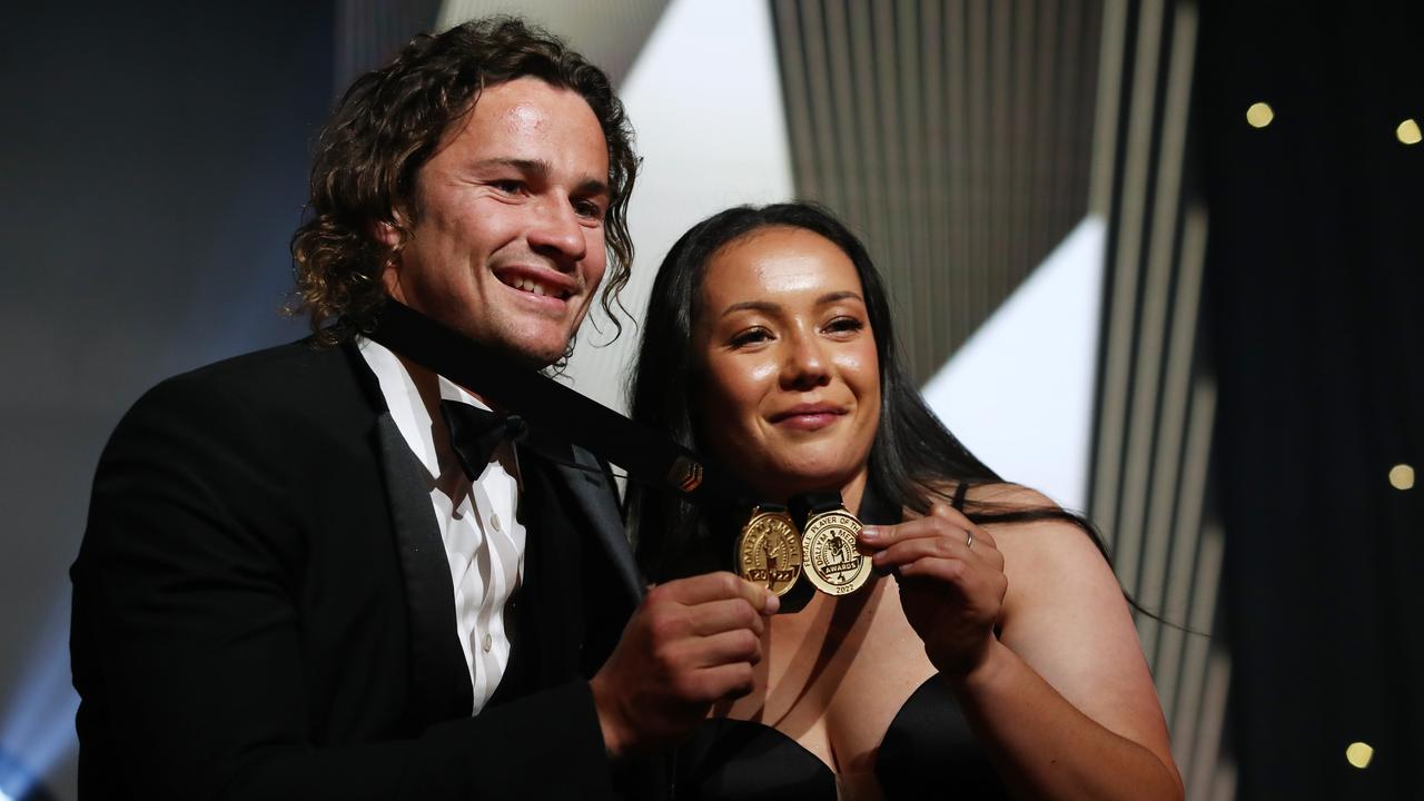 Nicho Hynes and Raecene McGregor pose with their Dally M Medals, but a name change could be coming. Picture; Jason McCawley/Getty Images