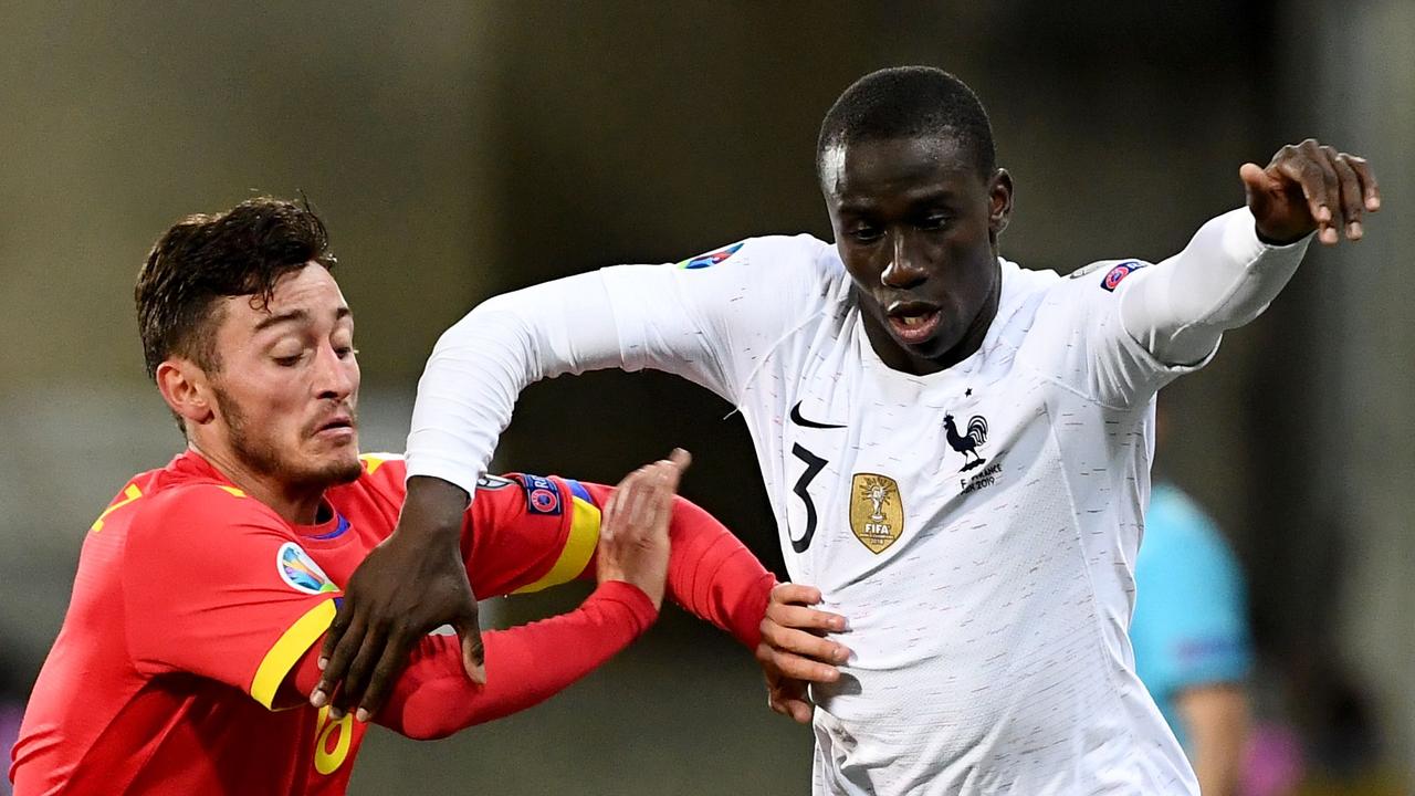 France's defender Ferland Mendy (R) is Real Madrid’s fourth star signing of the past fortnight as coach Zinedine Zidane undergoes a massive squad overhaul. (Photo by FRANCK FIFE / AFP)