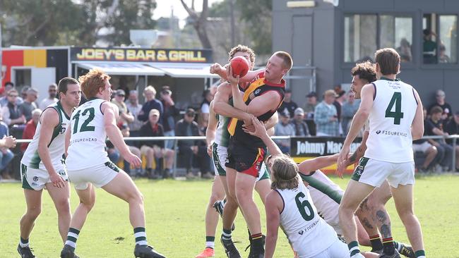 St Joseph's Keelin Betson gets a handball out. St Joseph's v Bell Park GFNL Football. Picture: Alan Barber