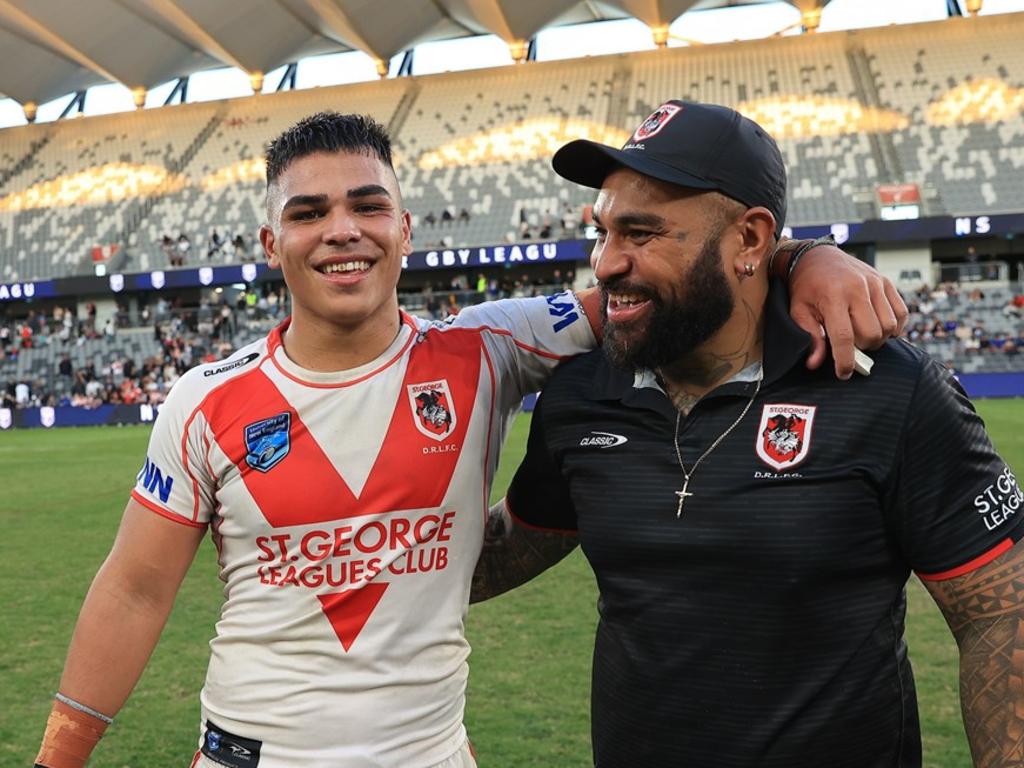 Jacob Halangahu with dad, Toa, after winning the SG Ball Cup with the Dragons. Picture: Dragons