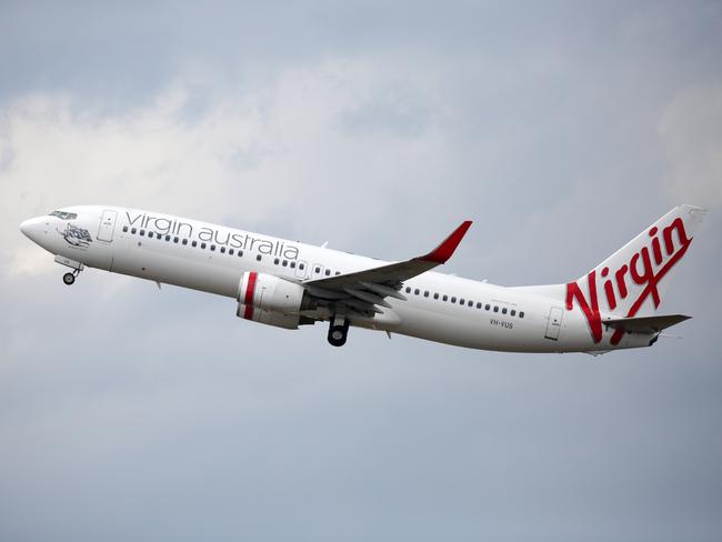 SYDNEY, AUSTRALIA - NewsWire Photos OCTOBER 08, 2020 - A Virgin Australia plane takes off at Sydney Airport on Thursday October 08, 2020.Picture: NCA NewsWire / Christian Gilles