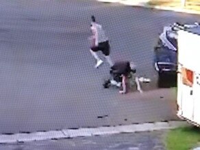 The moment Bond tried to take off after allegedly attempting to steal a car. Picture: 9 News Illawarra