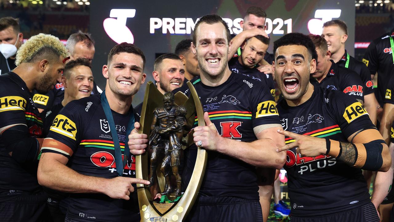 Nathan Cleary, Isaah Yeo and Tyrone May and the Panthers celebrate winning the 2021 NRL Grand Final between the Penrith Panthers and Souths Sydney Rabbitohs at Suncorp Stadium in Brisbane. Pics Adam Head