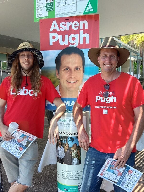 Labor's mayoral candidate for Byron Asren Pugh (right) with a supporter at a local polling place during the NSW council election on December 4, 2021.