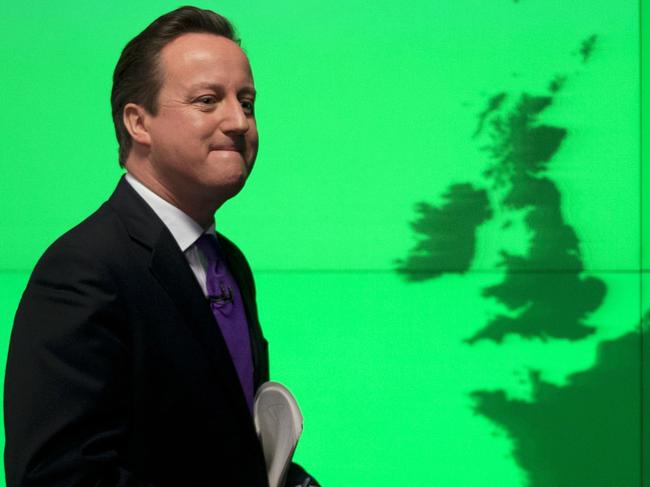Britain's Prime Minister David Cameron walks past a map of Europe on a screen as he walks away after making a speech on holding a referendum on staying in the European Union in London, Wednesday, Jan. 23, 2013. Cameron said Wednesday he will offer British citizens a vote on whether to leave the European Union if his party wins the next election, a move which could trigger alarm among fellow member states. He acknowledged that public disillusionment with the EU is 