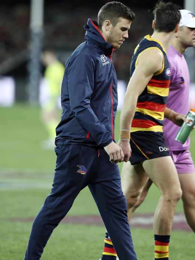 A devastated Paul Seedsman in his team tracksuit after suffering another hamstring injury. Picture Sarah Reed