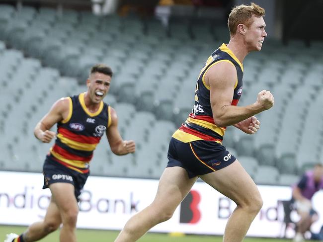 Tom Lynch celebrates his round-one goal against Sydney at an empty Adelaide Oval. Picture: Sarah Reed.