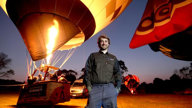 Up, up and away ... Ben Phillips, at a balloon launch at Westerfolds Park in Melbourne, says tax deductions are a huge help for his business. Picture: David Geraghty