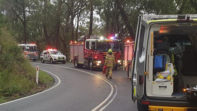 Emergency services at the scene on the Mountain Highway. Picture: The Basin CFA