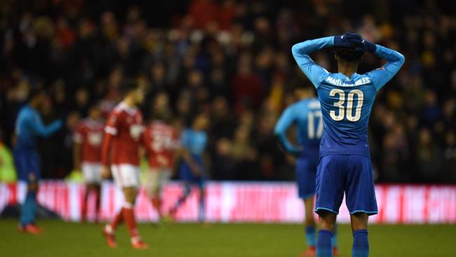 Arsenal's English midfielder Ainsley Maitland-Niles reacts after a 4-2 loss to Nottingham Forrest.