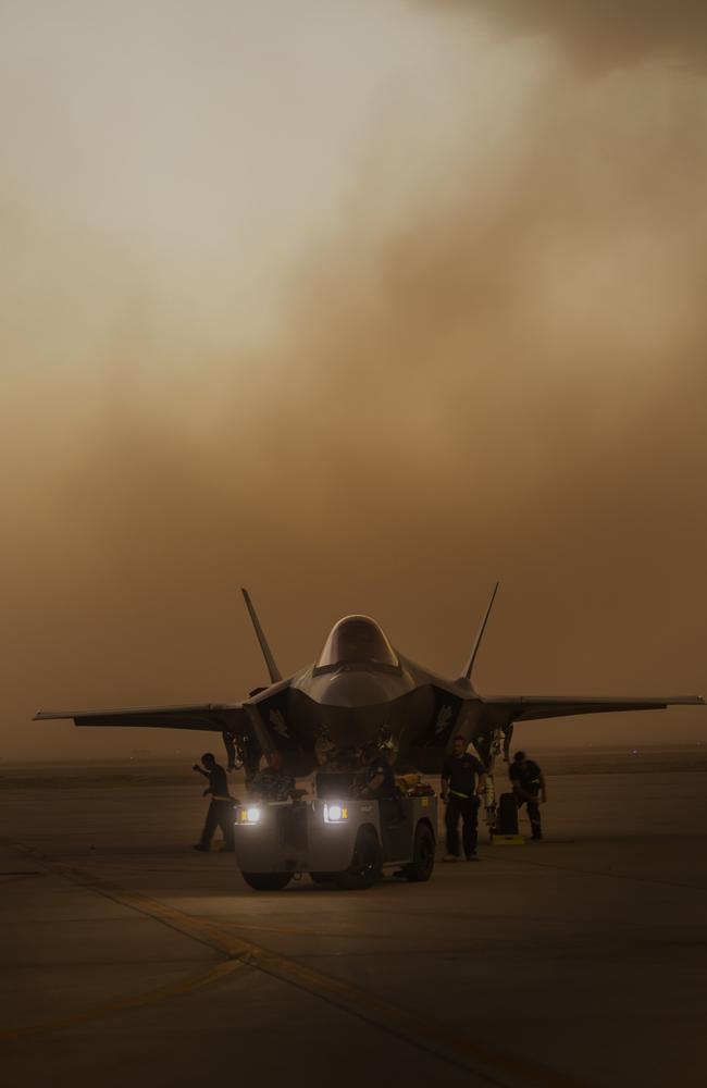 An Australian F-35A aircraft during a sudden dust storm at Luke Air Force Base, Arizona. The first two Lightning IIs to be based in Australia have touched-down. Picture: Defence