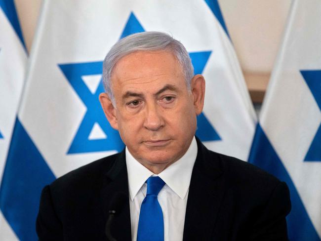 (FILES) In this file photo taken on May 19, 2021 Israeli Prime Minister Benjamin Netanyahu looks on during a briefing at the Hakirya military base in Tel Aviv. - Israel's opposition leader Yair Lapid said late on June 2, 2021 that he had succeeded in forming a coalition to end the rule of Prime Minister Benjamin Netanyahu, the country's longest serving leader. Once it is confirmed by the 120-member Knesset legislature, it would end the long reign of the hawkish right-wing leader known as Bibi who has long dominated Israeli politics. (Photo by Sebastian Scheiner / POOL / AFP)