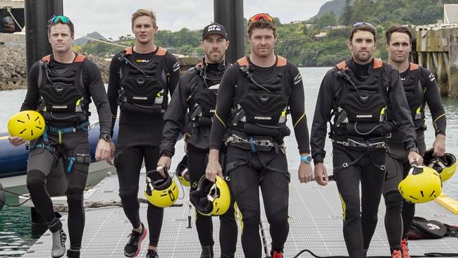 Tom Slingsby, centre front, and his team, after sail training on their F50 in New Zealand. Pic: Chris Cameron/SailGP