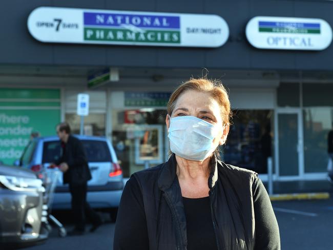 A customer named Yelta outside the National Pharmacies at Findon Shopping Centre, where a staff member tested positive to coronavirus. Picture: Mark Brake