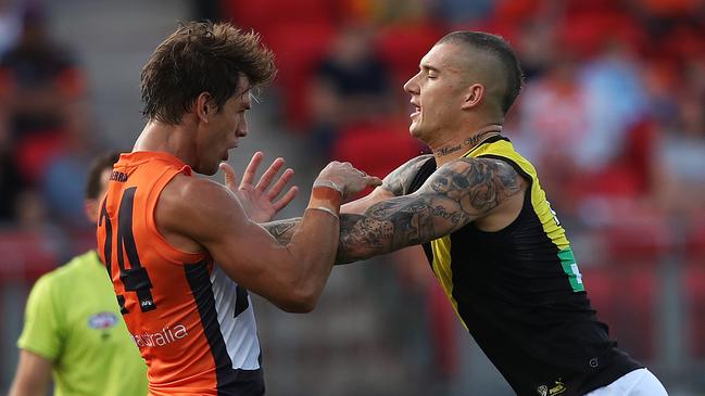 Dustin Martin pushes Giants tagger Matt de Boer last Saturday. Picture: Phil Hillyard