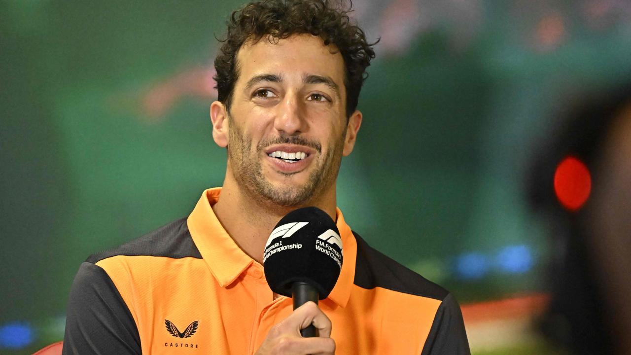 Daniel Ricciardo had reason to smile again. (Photo by Attila KISBENEDEK / AFP)