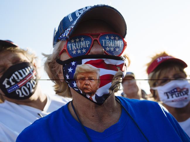 Cathy Murph, 59, covers up at the rally in Hickory, North Carolina. Picture: Angus Mordant