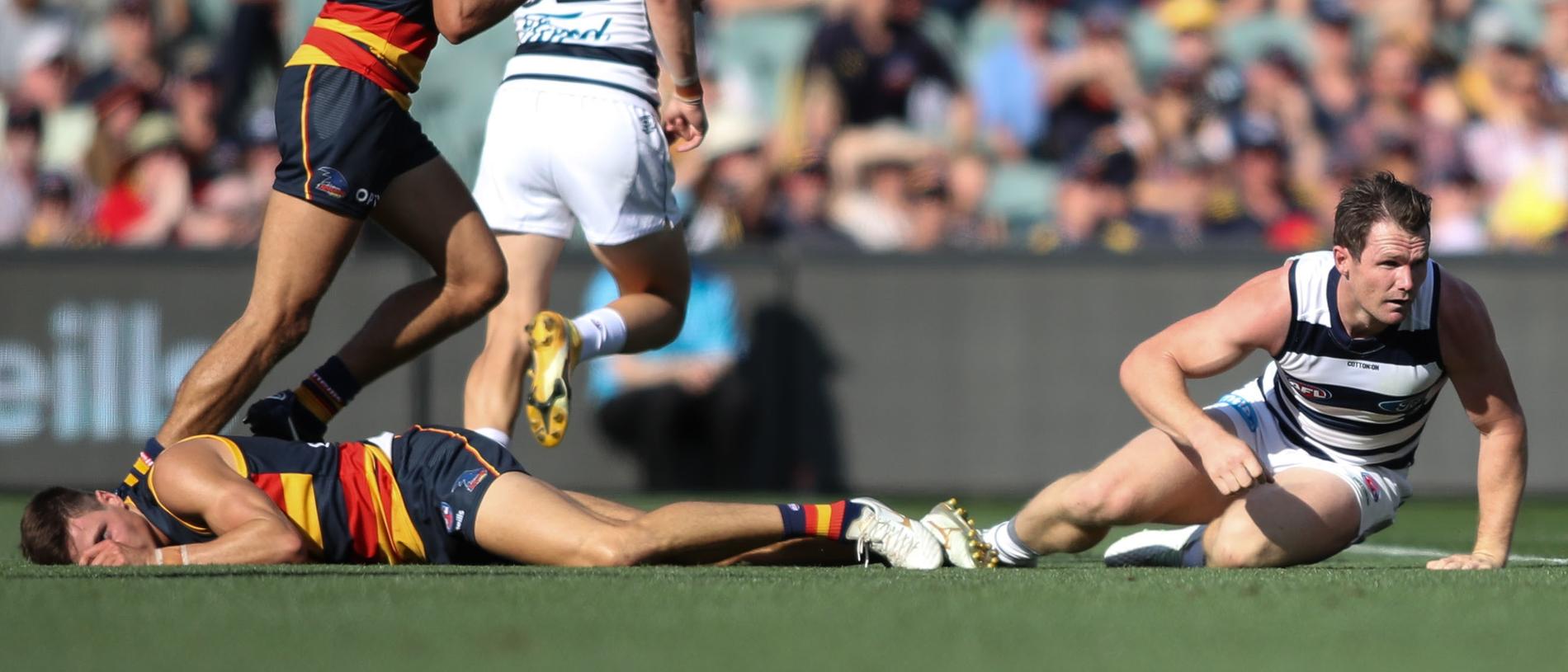 Jake Kelly came off second best in a head clash with Patrick Dangerfield.