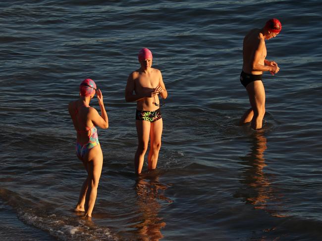 Swimmers visit Manly Beach despite social distancing rules. Picture: Matrix Media Group