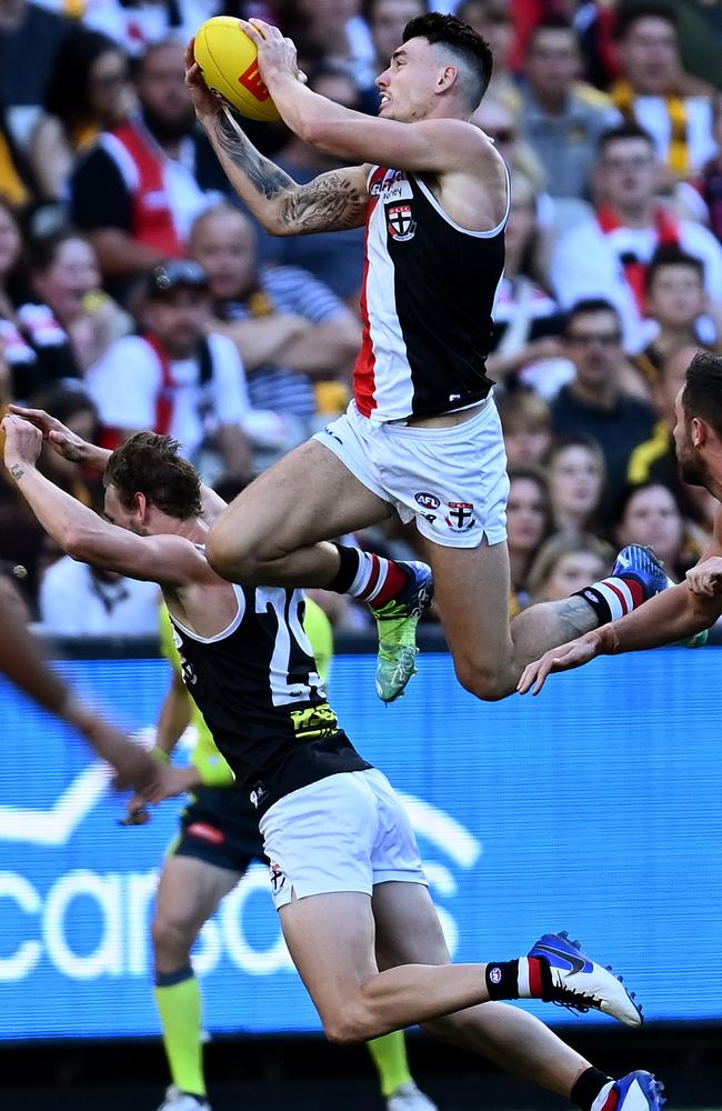 Josh Battle climbs over Jimmy Webster to mark. Picture: Quinn Rooney/Getty Images