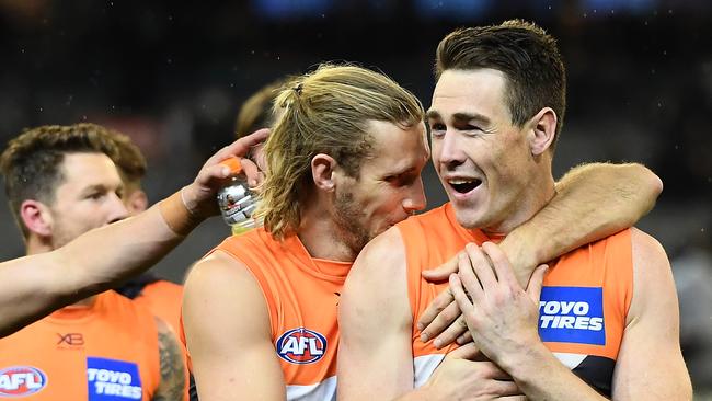 MELBOURNE, AUSTRALIA - SEPTEMBER 21: Nick Haynes and Jeremy Cameron of the Giants celebrate winning the AFL Preliminary Final match between the Collingwood Magpies and the Greater Western Sydney Giants at the Melbourne Cricket Ground on September 21, 2019 in Melbourne, Australia. (Photo by Quinn Rooney/Getty Images)