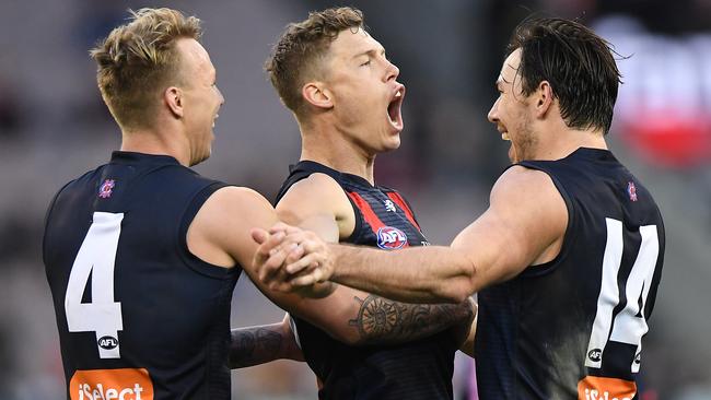 James Harmes, Jake Melksham and Michael Hibberd celebrate a goal during the big win over GWS. Picture: AAP