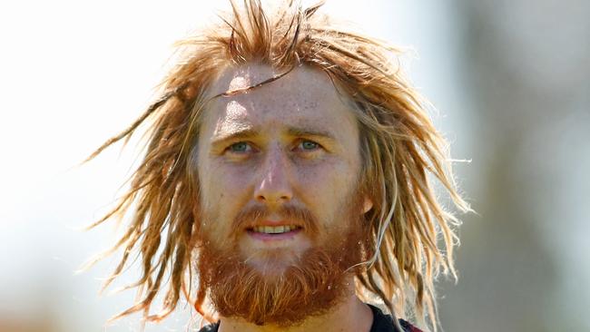 Dyson Heppell of the Bombers — the redhead.