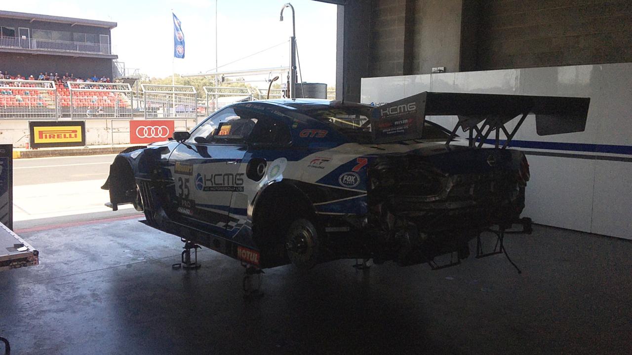 The damaged #35 in the garage following the accident.