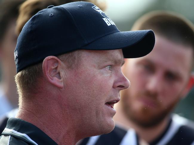 Phil Plunkett coach of Bundoora addresses his players during the NFL footy match between Bundoora and Whittlesea played at Yulong Reserve in Bundoora on Saturday 7th May, 2016. Picture: Mark Dadswell