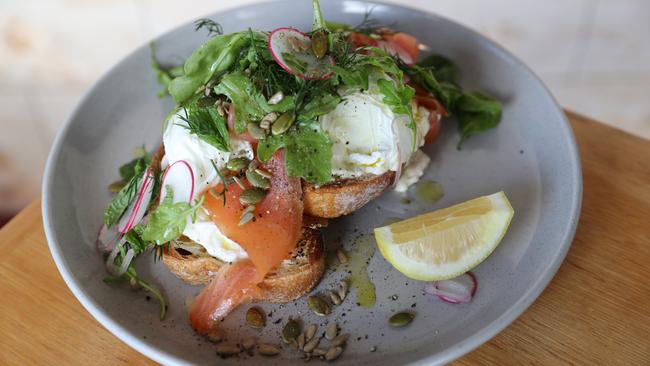 Cold smoked salmon and KI poached free range eggs served with horseradish cream and rocket and pepita salad on sour dough toast. Picture: Tait Schmaal