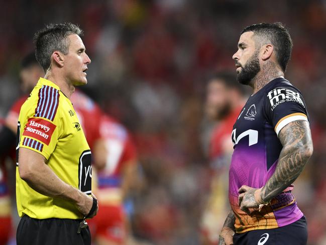 Adam Gee talks to Brisbane skipper Adam Reynolds. Picture: NRL Images