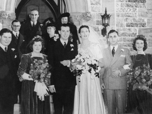 04/1942. Gough Whitlam with his bride, who was Miss Margaret Dovey, daughter of the late Mr Justice Dovey, pictured after their wedding.