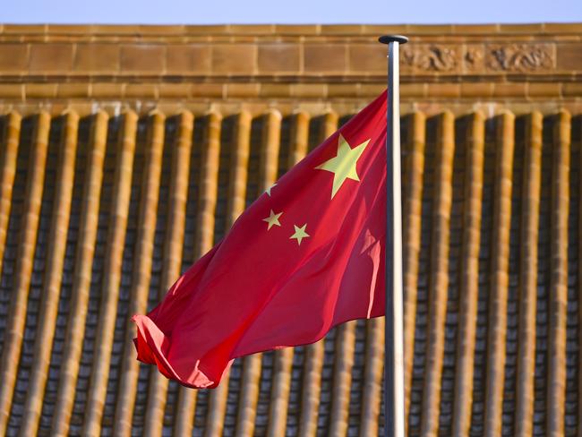 The Chinese flag is seen at the Chinese Embassy in Canberra, Tuesday, May 12, 2020. (AAP Image/Lukas Coch) NO ARCHIVING