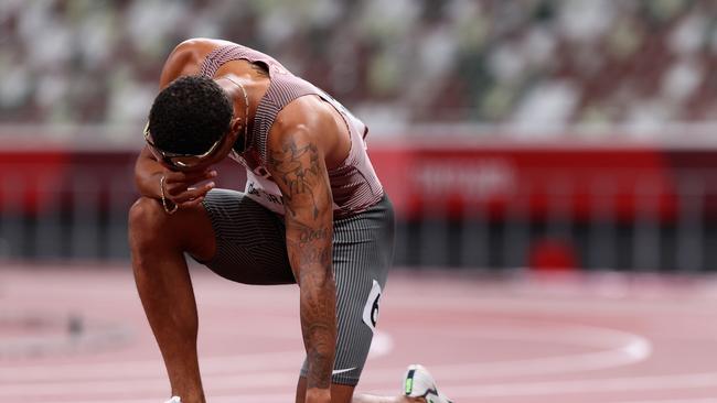 TOKYO, JAPAN - AUGUST 04: Andre De Grasse of Team Canada reacts after winning the gold medal in the Men's 200m Final on day twelve of the Tokyo 2020 Olympic Games at Olympic Stadium on August 04, 2021 in Tokyo, Japan. (Photo by Christian Petersen/Getty Images)