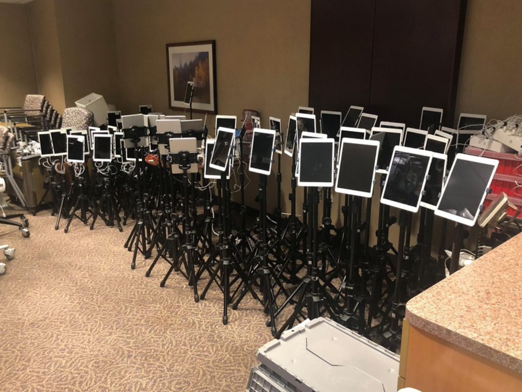 A family doctor shared this picture of a room full of iPads on stands, alongside the caption: “These are iPad stations being prepared for virtual ICU end of life visits by a palliative care doc I know. Jesus.”