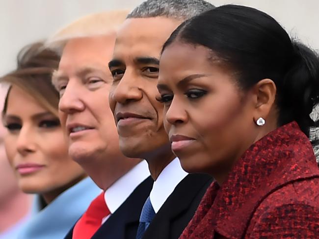 AFP presents a retrospective photo package of 60 pictures marking the 4-year presidency of President Trump.  L-R: First Lady Melania Trump, President Donald Trump,former President Barack Obama, Michelle Obama at the US Capitol after inauguration ceremonies at the in Washington, DC, on January 20, 2017. (Photo by JIM WATSON / AFP)