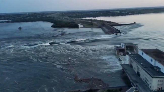 The Kakhovka hydroelectric dam floods after the attack. Picture: AFP.