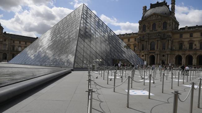 The forecourt of the Louvre is deserted despite reopening. Picture: Getty Images.