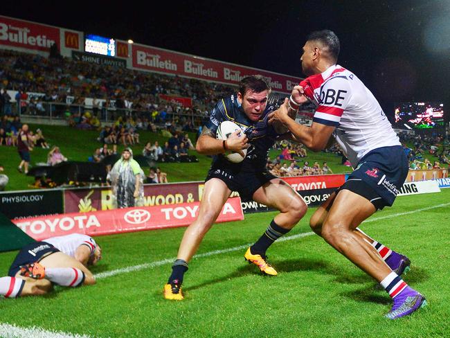 Kyle Feldt stole the show against the Roosters, brushing off three defenders to escape the in-goal. Picture: Zak Simmonds