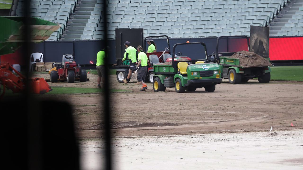 Parts of the MCG turf will be replaced ahead of the AFL round 1. Tractors and workmen busy ripping up and replacing the MCG turf. Picture: David Caird