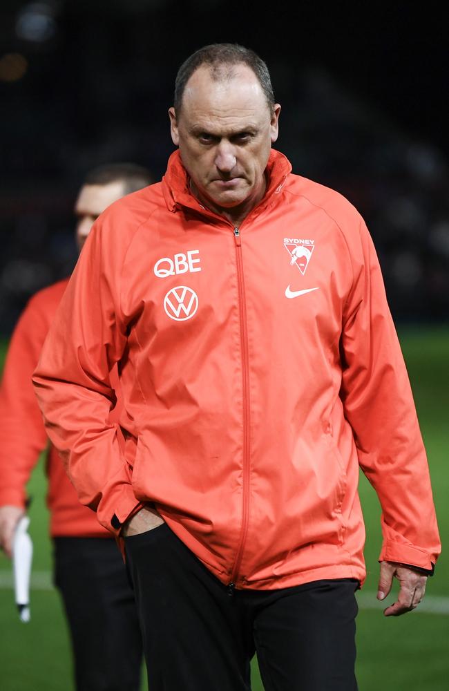 ADELAIDE, AUSTRALIA - AUGUST 03: John Longmire, Senior Coach of the Swans leave the ground after losing the round 21 AFL match between Port Adelaide Power and Sydney Swans at Adelaide Oval, on August 03, 2024, in Adelaide, Australia. (Photo by Mark Brake/Getty Images)